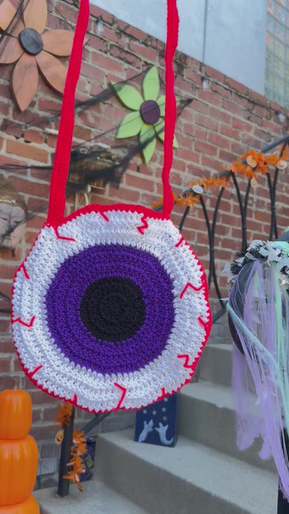 Bloodshot Purple and Orange Eye Crossbody Bag